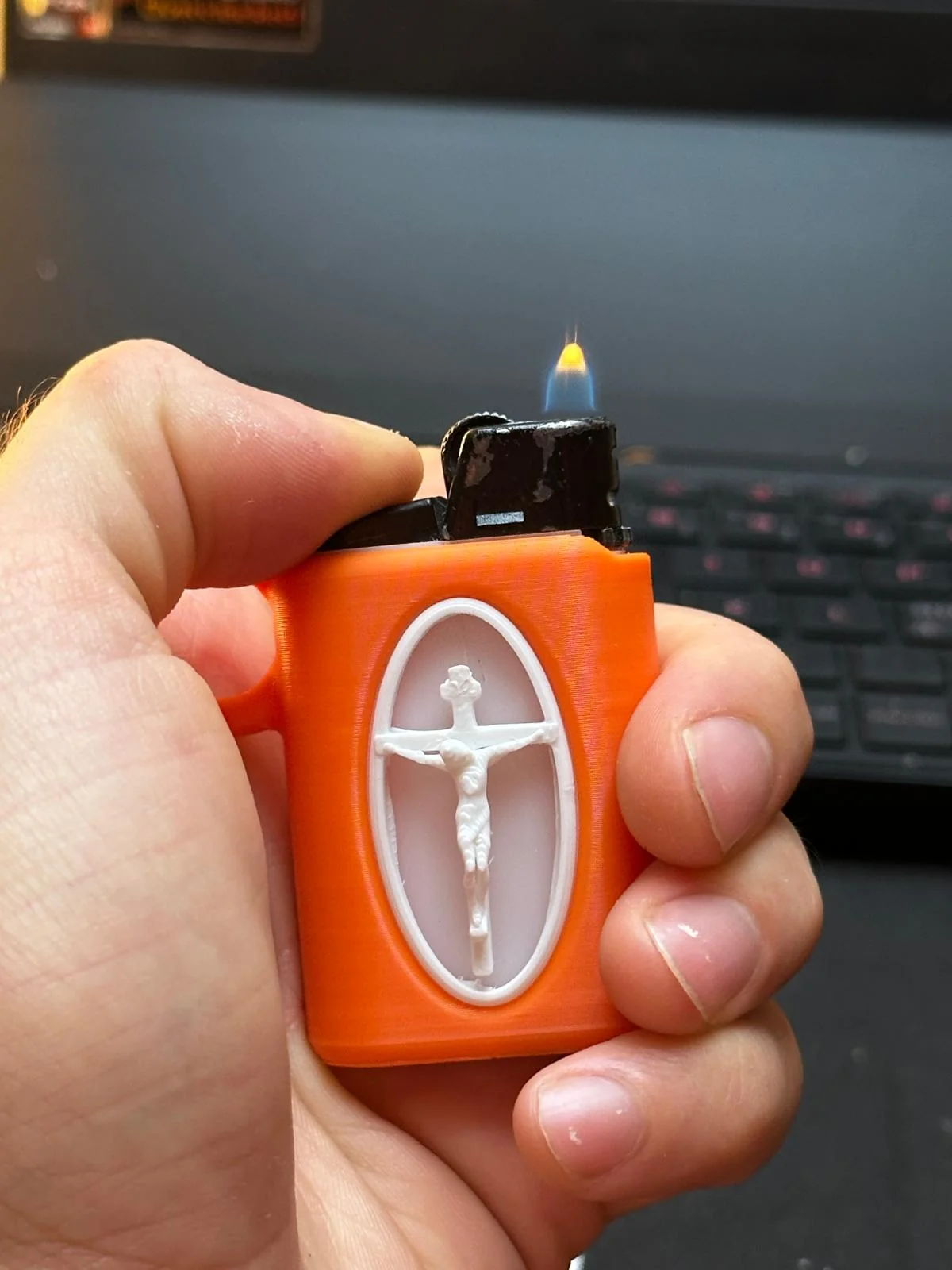 Lighter sleeve, Crucifix medallion